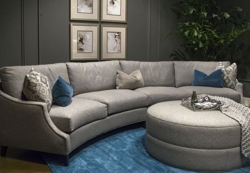 Luxury Curved Gray Sectional Sofa with Blue Rug