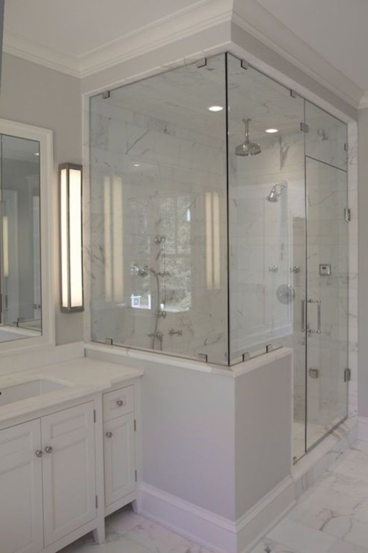 Modern Bathroom with Glass Shower and Half Wall