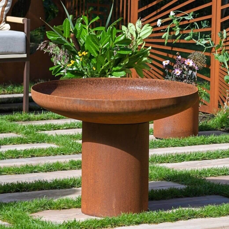 Modern bird bath that also works as plant or fire bowl