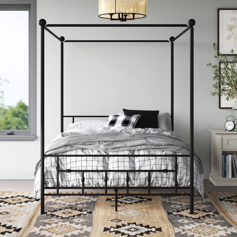 Modern Black Four Poster Bed with Cozy Bedding