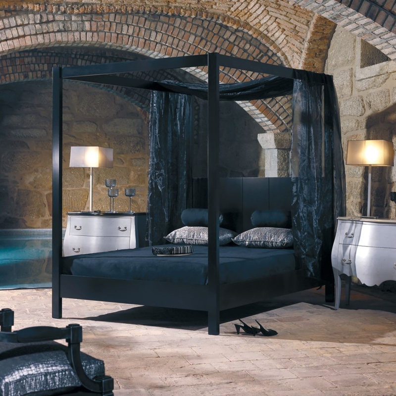 Modern Black Four Poster Bed with Rustic Stone Walls