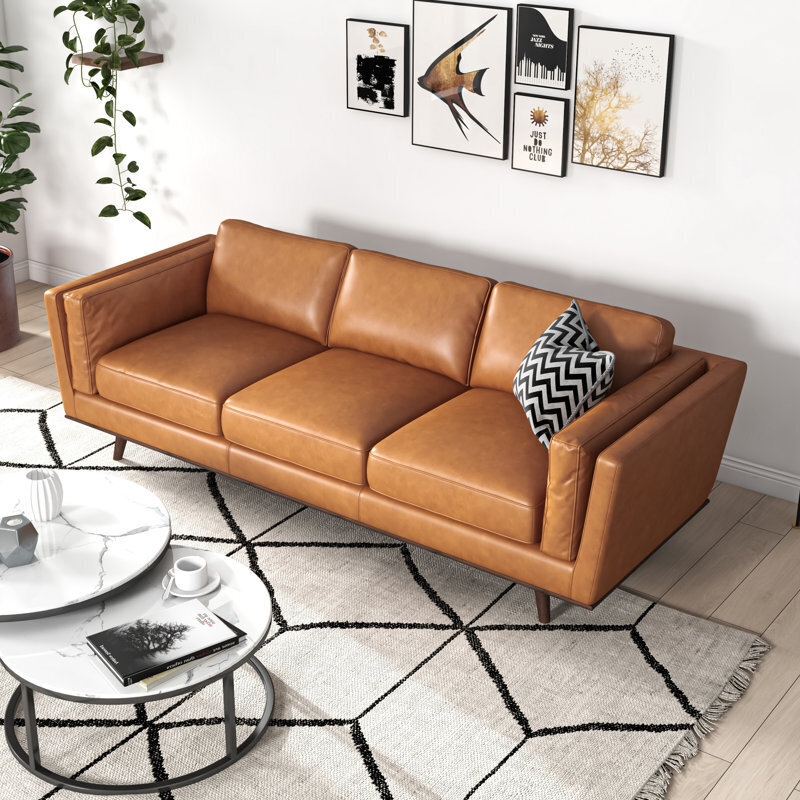 Modern Camel Leather Sofa with Geometric Rug