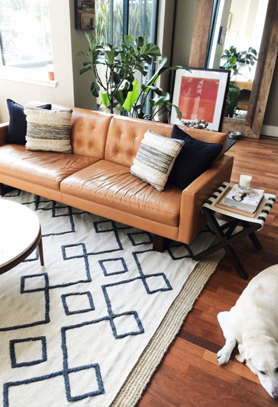 Modern Camel Leather Sofa with Geometric Rug