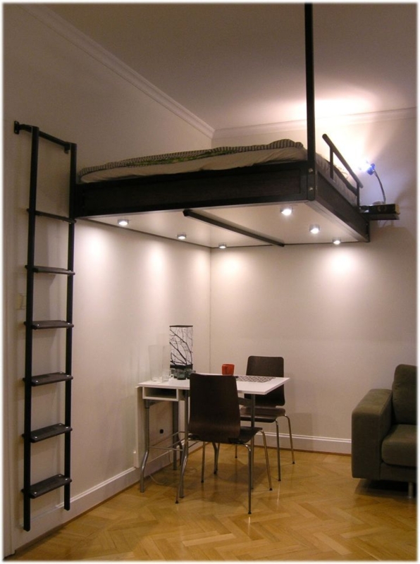 Modern Floating Loft Bed with Ladder and Dining Space
