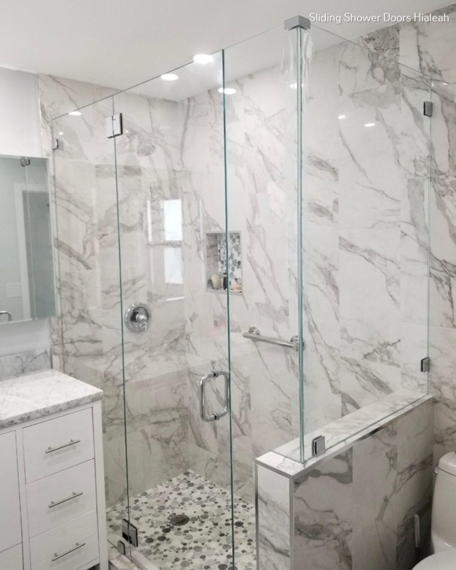 Modern Frameless Glass Shower with Marble Walls