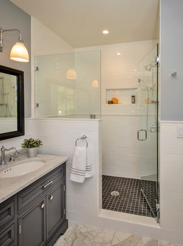 Modern Glass Half Wall Shower with Black Tile Flooring