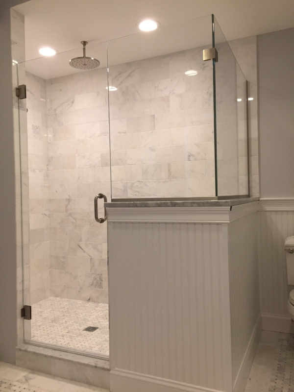 Modern Glass Half Wall Shower with Marble Tile