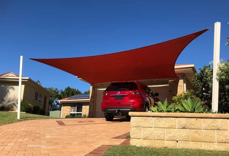 Modern Red Shade Sail Carport Over Driveway