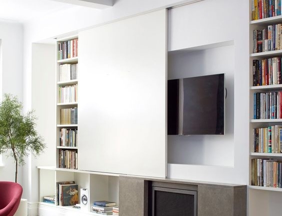 Modern Sliding Panel to Hide TV in Living Room