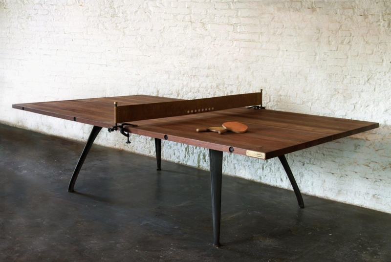 Modern Wooden Ping Pong Table Against White Brick Wall