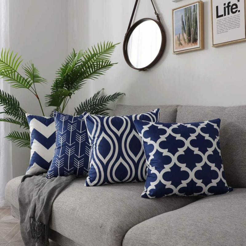 Navy Blue Patterned Velvet Throw Pillows on Grey Sofa