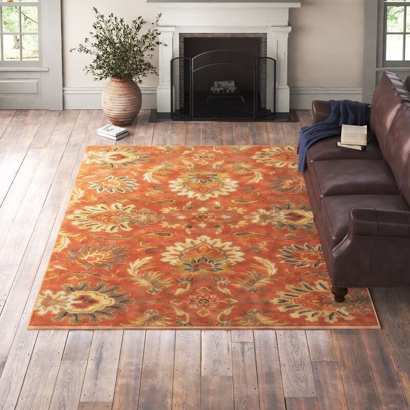Rust Colored Floral Designer Rug in Living Room