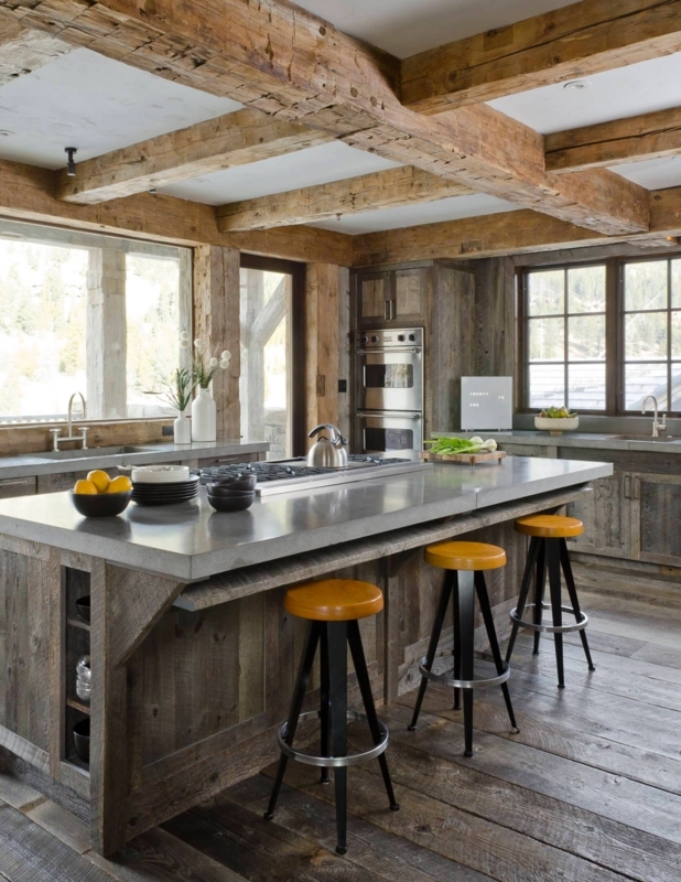 Rustic Kitchen Island with Concrete Countertop and Wooden Beams