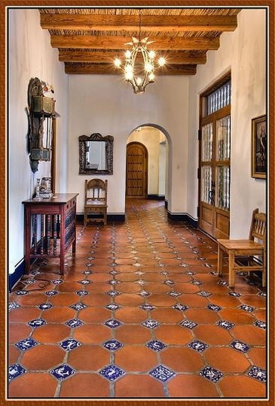Rustic Spanish Tile Flooring with Blue Accents