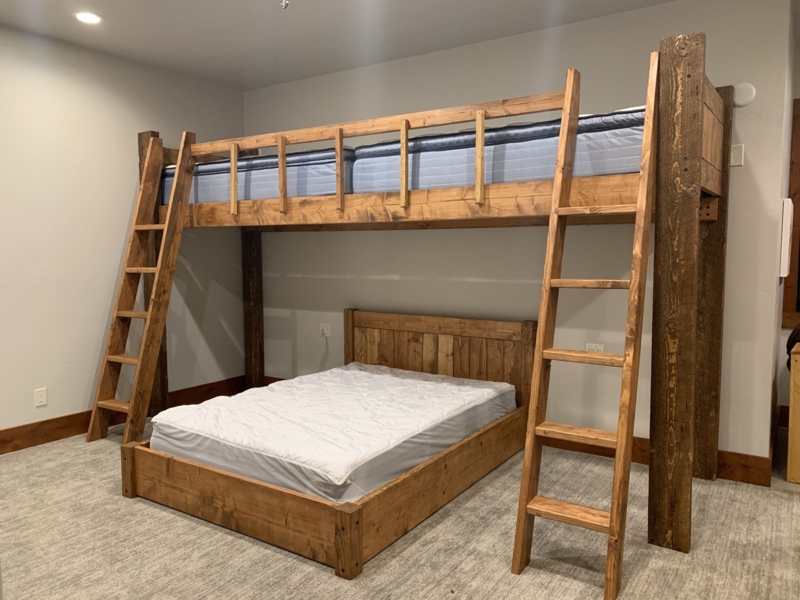 Rustic Wooden Bunk Bed with Dual Ladders