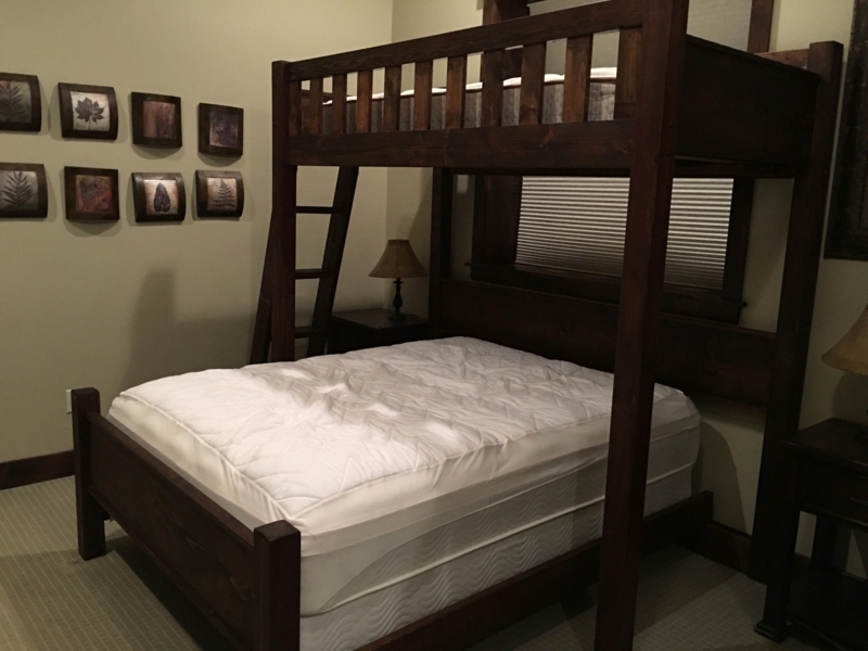 Space-Saving Dark Wood Queen Bunk Beds Design