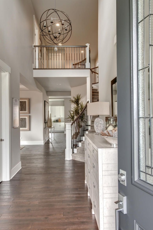 Spacious Two-Story Foyer with Modern Chandelier