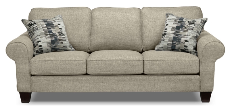 Taupe Sofa with Geometric Patterned Accent Pillows