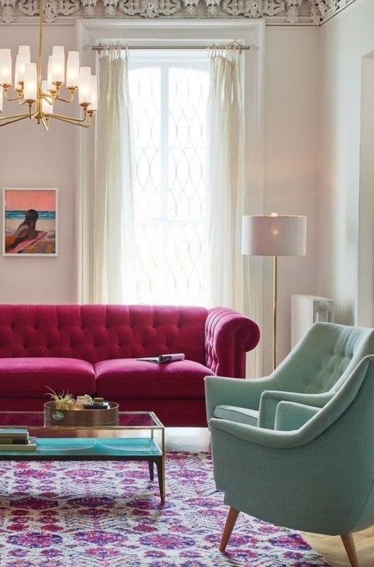 Vibrant Hot Pink Sofa with Pastel Blue Accent Chair