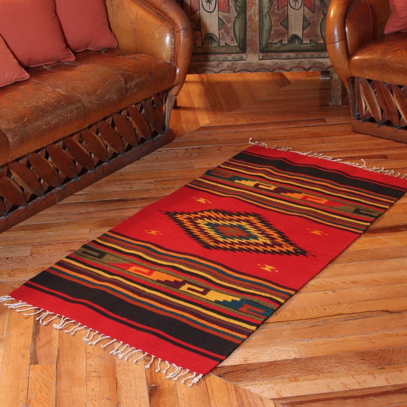 Vibrant Latin American Handwoven Rug on Hardwood Floor