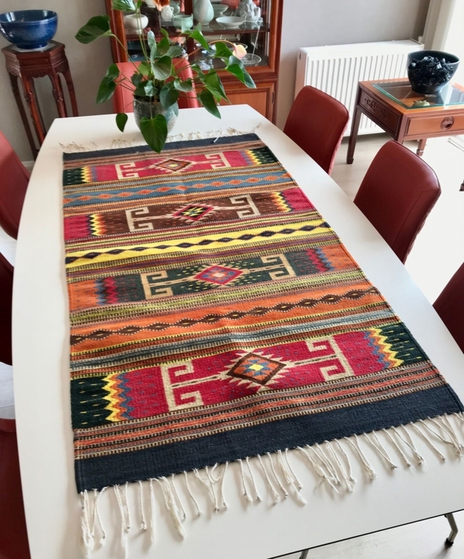 Vibrant Mexican Area Rug Accent on Dining Table