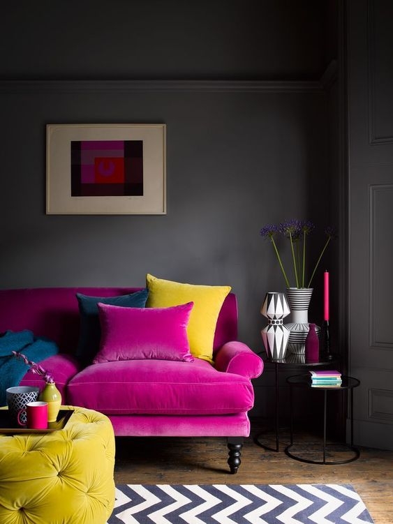 Vibrant Pink Sofa with Bold Accent Colors