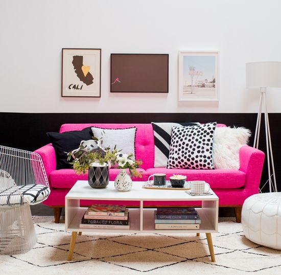 Vibrant Pink Sofa with Modern Black and White Accents