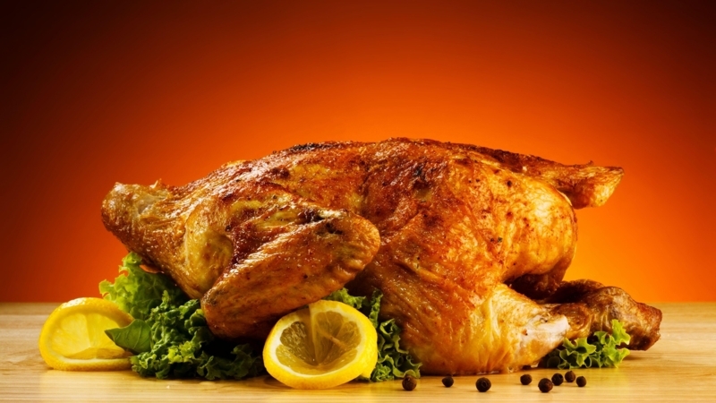Warm Toned Roasted Chicken with Lemon Decoration