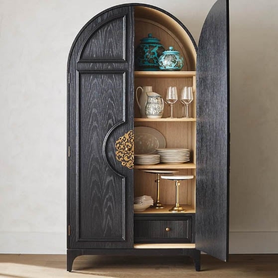 Black Arch Cabinet with Brass Hardware Accents