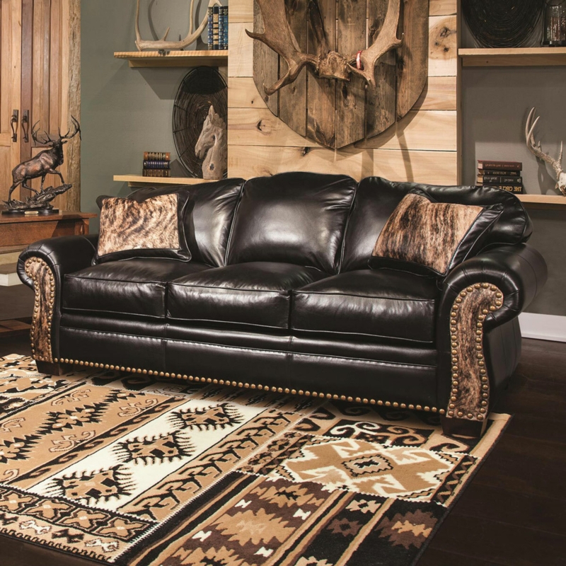 Black Leather Sofa with Rustic Western Decor Accents