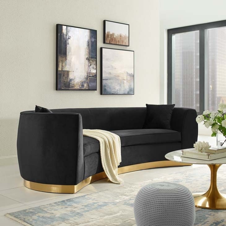 Black Velvet Curved Sofa with Gold Base Design