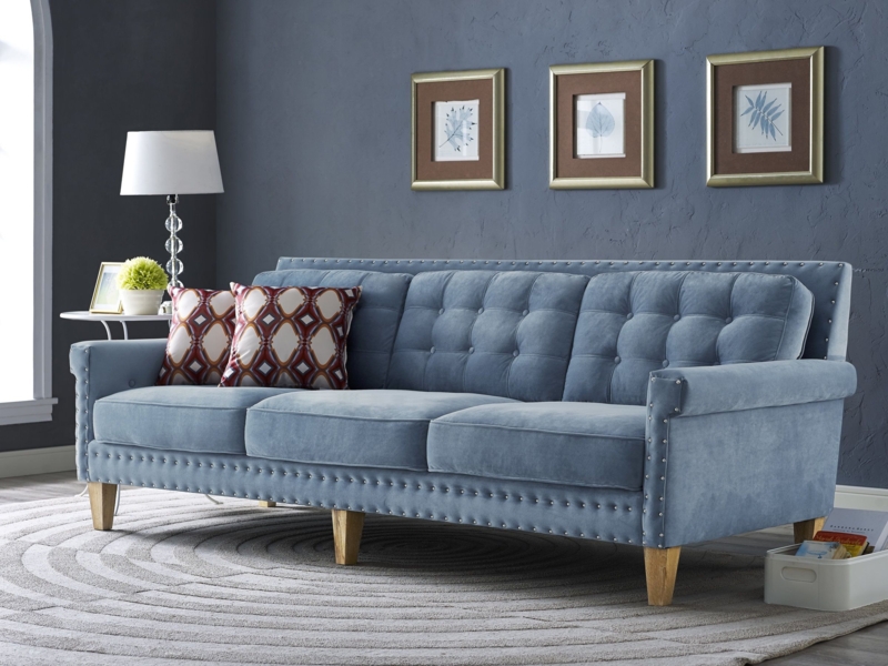 Blue Velvet Sofa with Chic Boho Accents