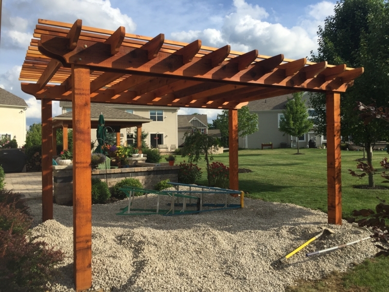 Cedar Pergola with Polycarbonate Roof and Stone Base