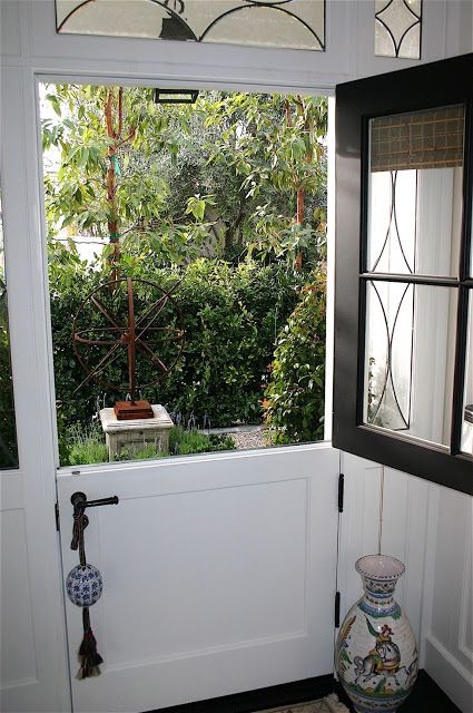 Charming White Dutch Doors with Decorative Screens