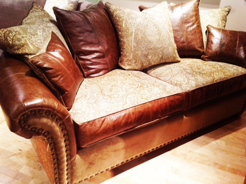 Classic Rustic Brown Leather Couch with Patterned Cushions