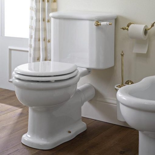Classic Vintage White Toilets with Brass Accents