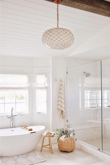 Coastal Bathroom with Elegant Netted Chandelier