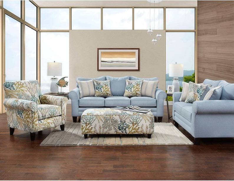 Coastal Blue Sofas with Floral Accents Living Room