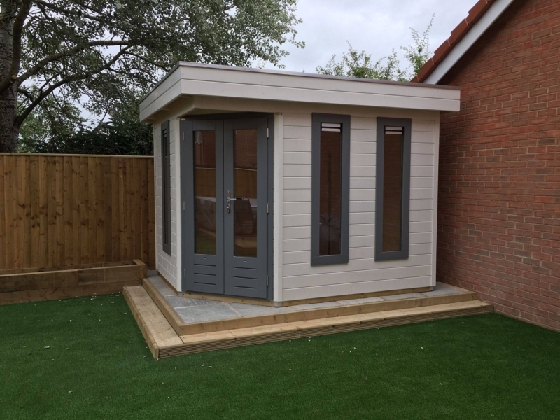Compact Modern Garden Shed with Gray Trim