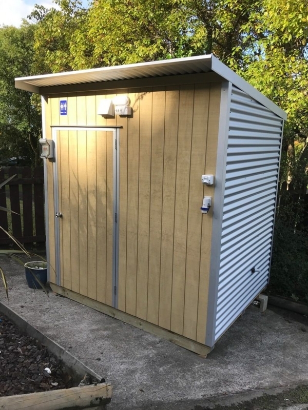 Compact Outdoor Shed with Functional Bathroom