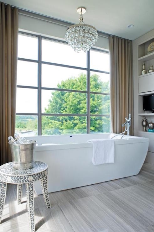 Contemporary Bathroom with Chandelier Over Bathtub
