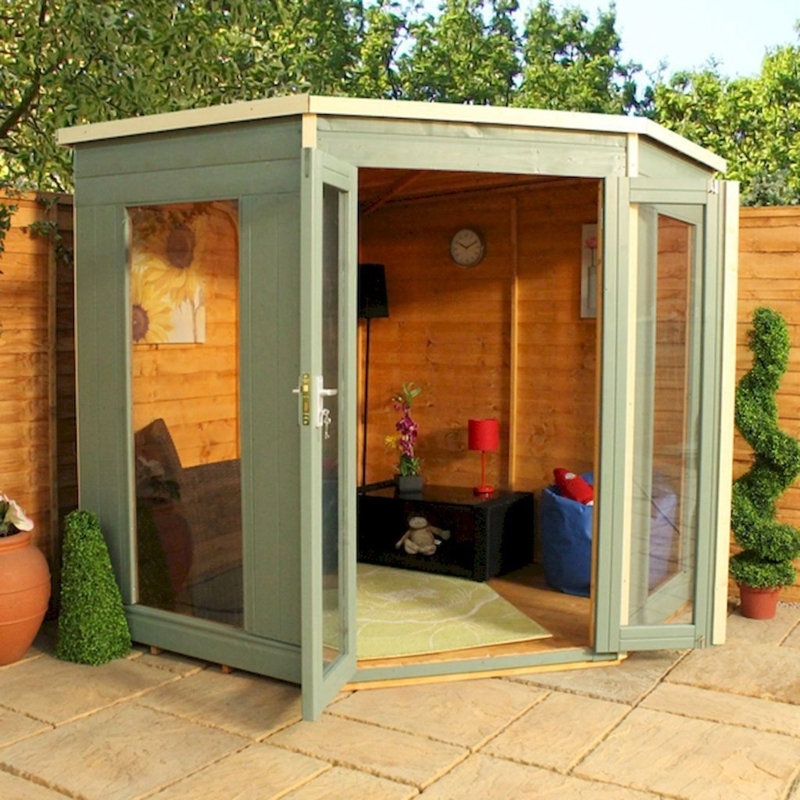 Cozy Backyard Studio Shed with Glass Doors