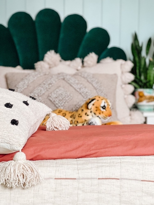 Cozy Kids Bedroom with Velvet Scalloped Headboard