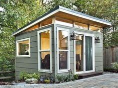Cozy Modern She Shed with Glass Doors