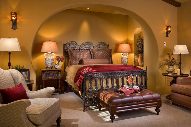 Cozy Spanish Style Bedroom with Rustic Iron Bed