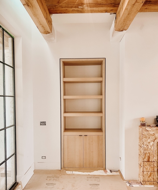 Custom Built-In White Oak Bookcases with Storage