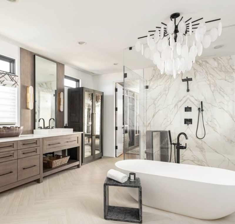 Elegant Bathroom with Chandelier Above Bathtub