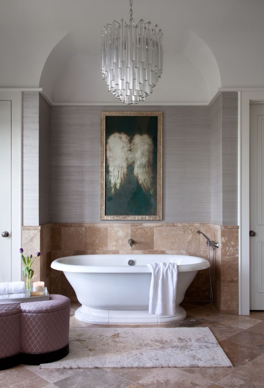 Elegant Bathroom with Crystal Chandelier and Freestanding Tub