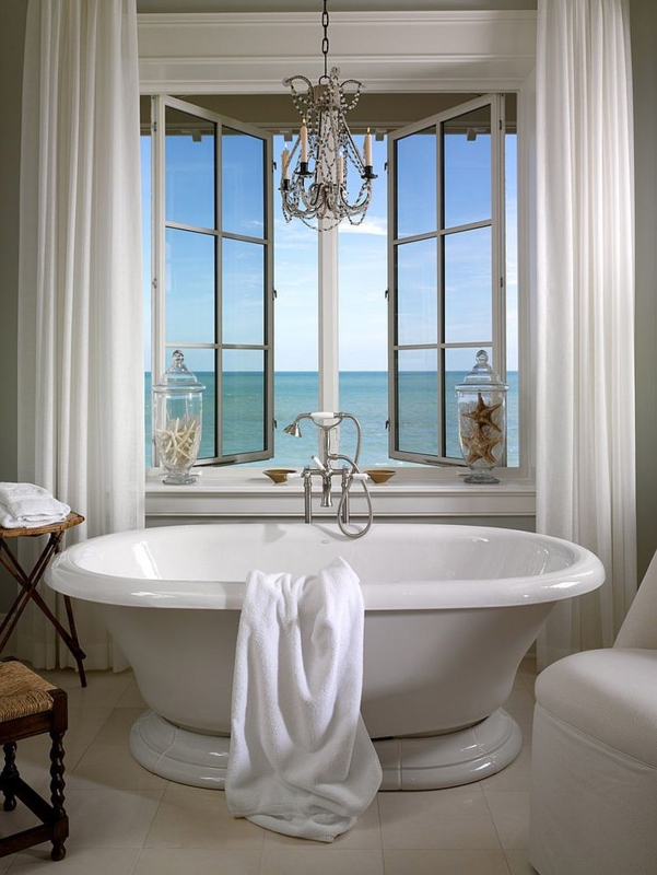 Elegant Bathroom with Crystal Chandelier and Ocean View