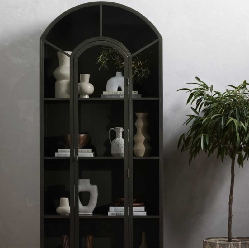 Elegant Black Arched Cabinet with Decorative Vases